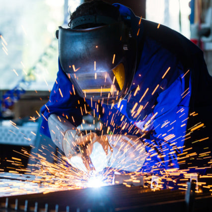 Welding SuppliesA welder working while sparks are flying.
