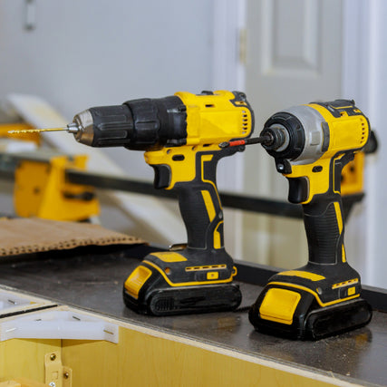 Power Tools & SuppliesTwo yellow power drills placed next to one another.
