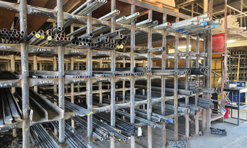 Pipes stacked inside of the United Supply Inc. warehouse.